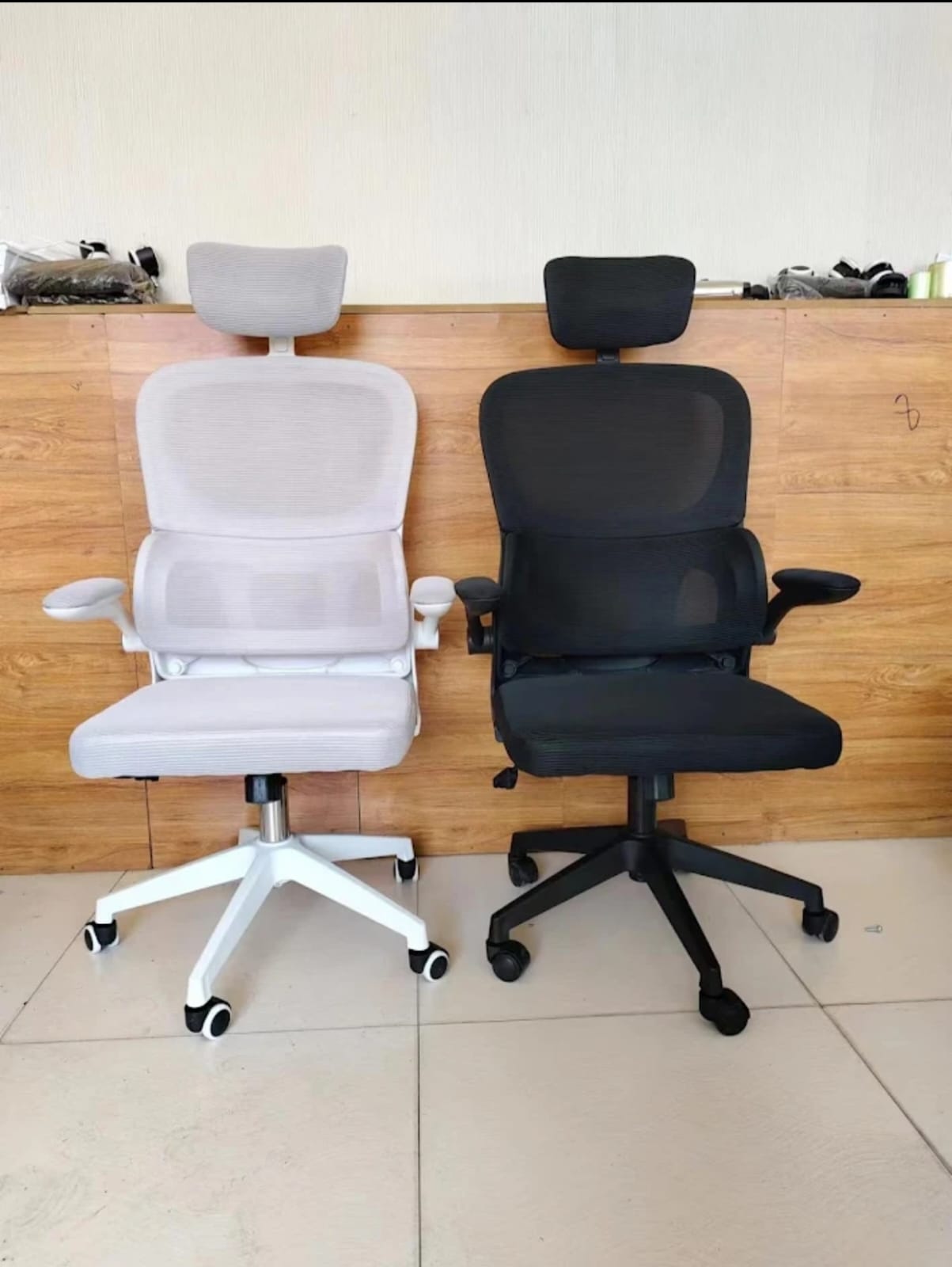 White and black ergonomic mesh chairs