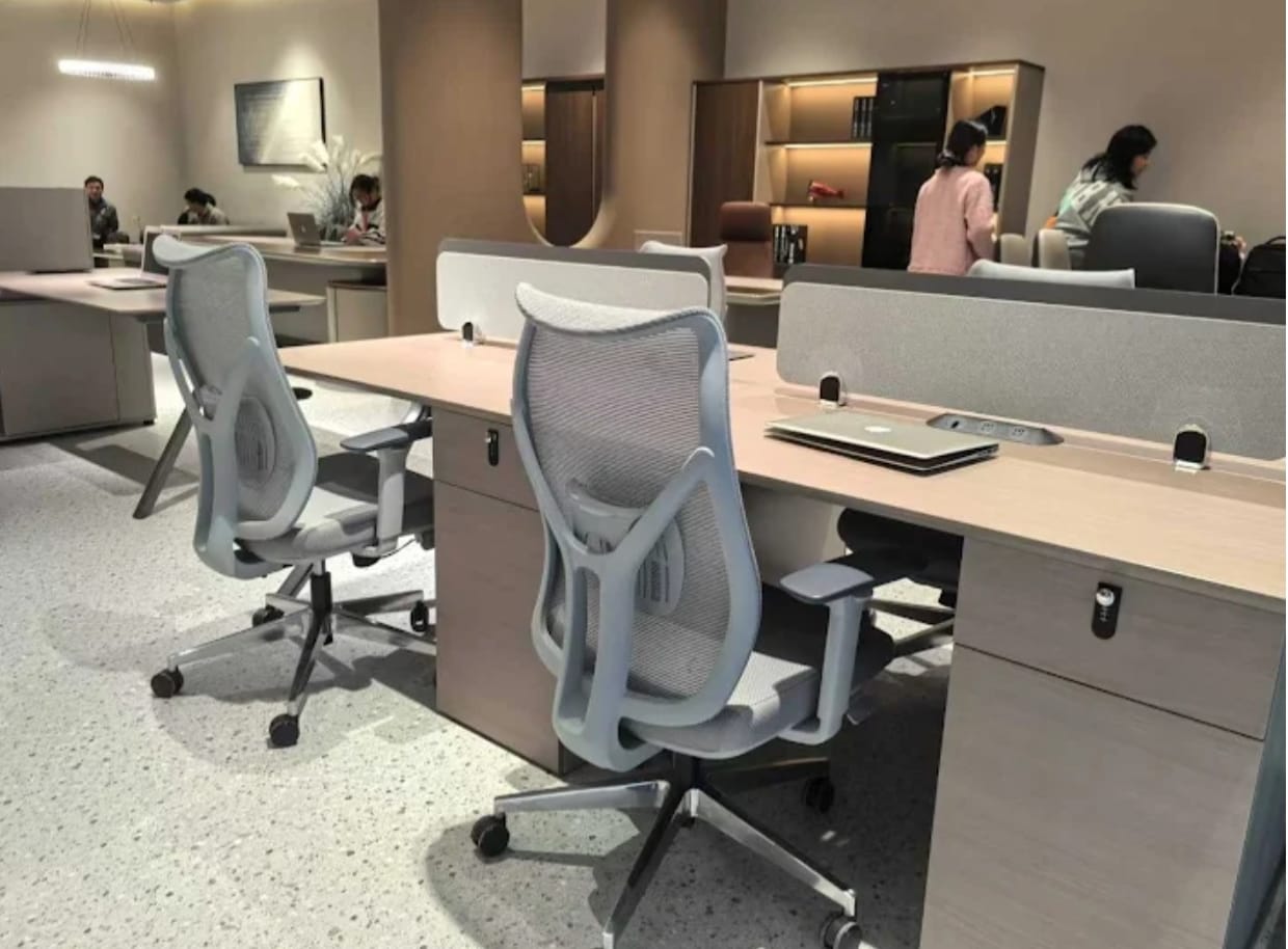 Modern workstation with grey mesh chairs